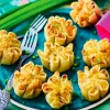 8 bouchées de poulet au saté 2 parts