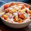 Bol de patate douce grillée, pois chiche, tomate