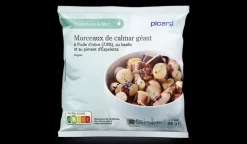 Morceaux de calmar géant huile d'olive basilic pi