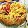 Riz cuisiné à l'espagnole (poivrons, petits pois)