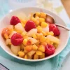 Sachet de fruits poire, pêche jaune, framboise