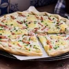 Tarte flambée, munster, jambon, oignon